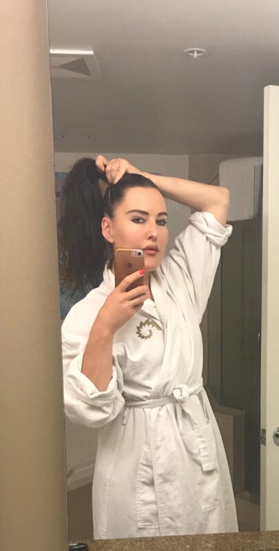emma with hair up in robe